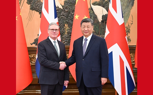 习近平会见英国首相斯塔默